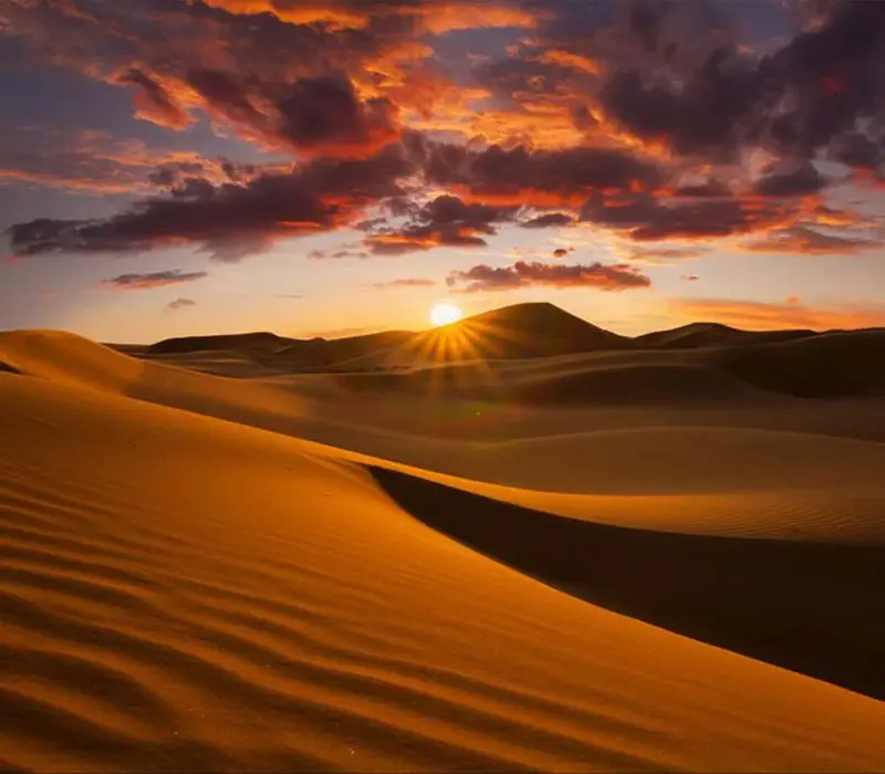 watching the sunset in the desert