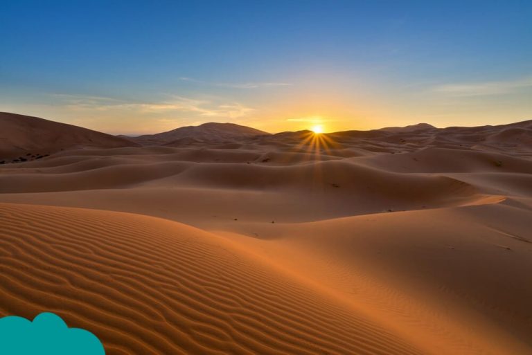 Expansive Sahara dunes under a clear sky – Around Dunes and Khamlia Village