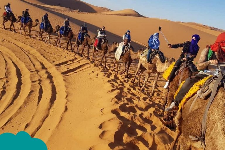 Camel caravan crossing Sahara Desert – Morocco Travel Packages